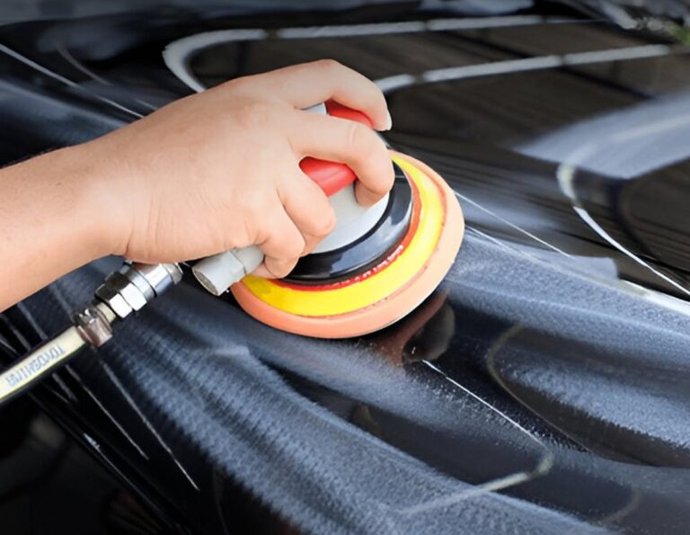 Machine polishing black car paint