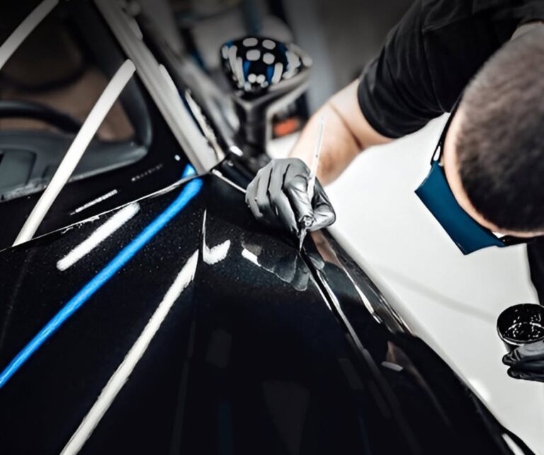 Precision detailing on black paint